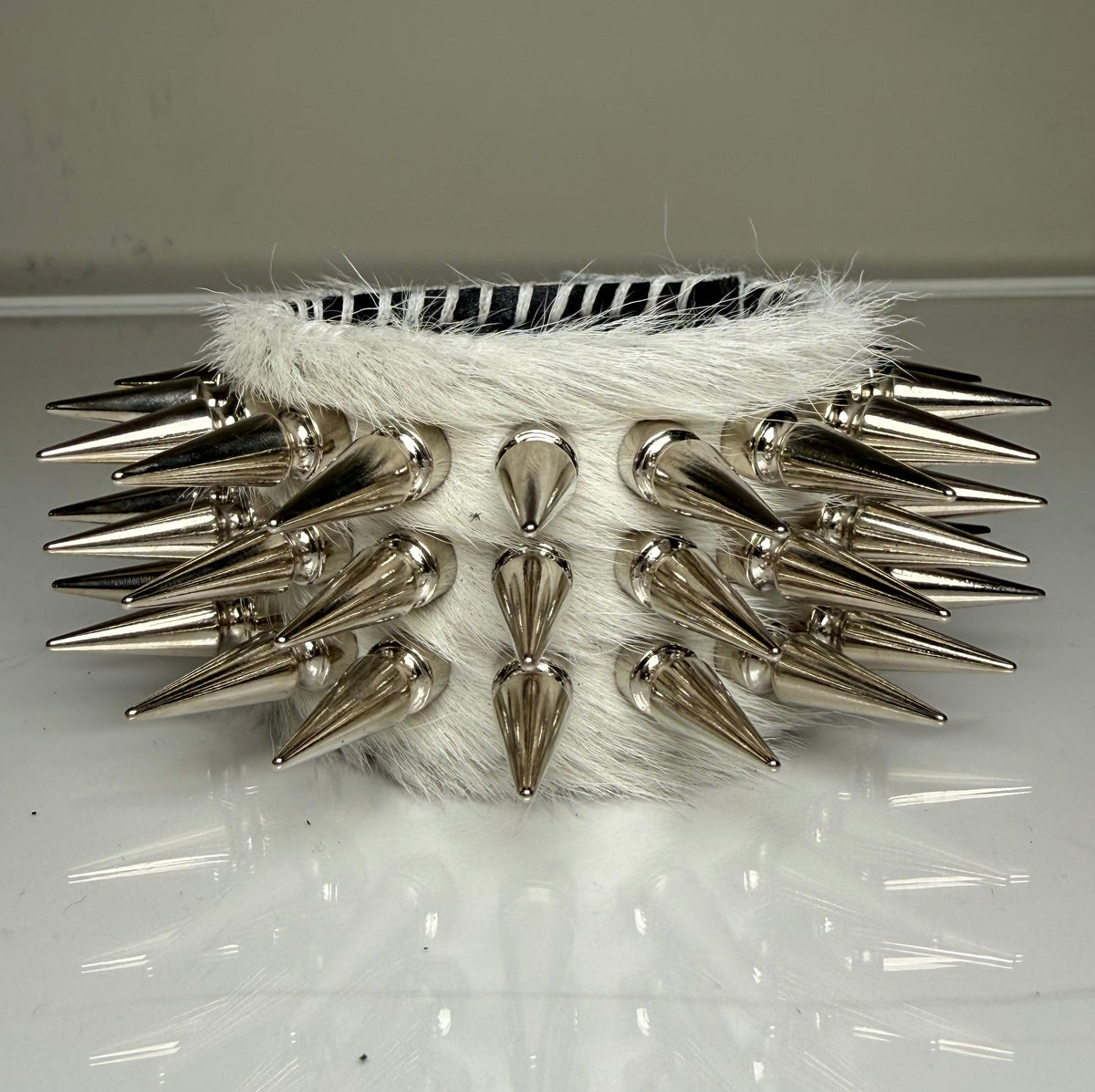 WHITE HAIR-ON HIDE SPIKEY CUFF