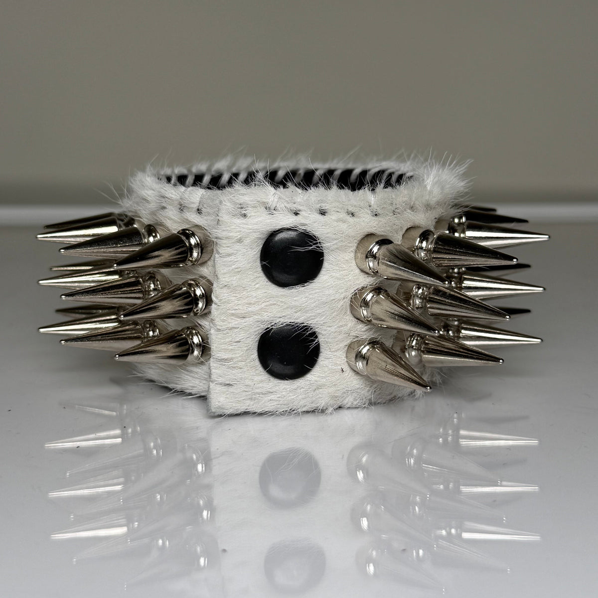 WHITE HAIR-ON HIDE SPIKEY CUFF