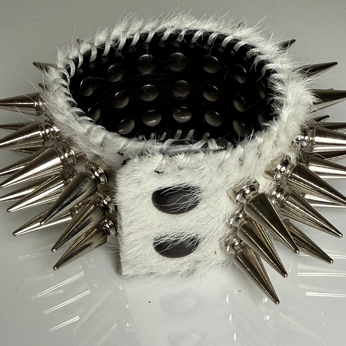 WHITE HAIR-ON HIDE SPIKEY CUFF