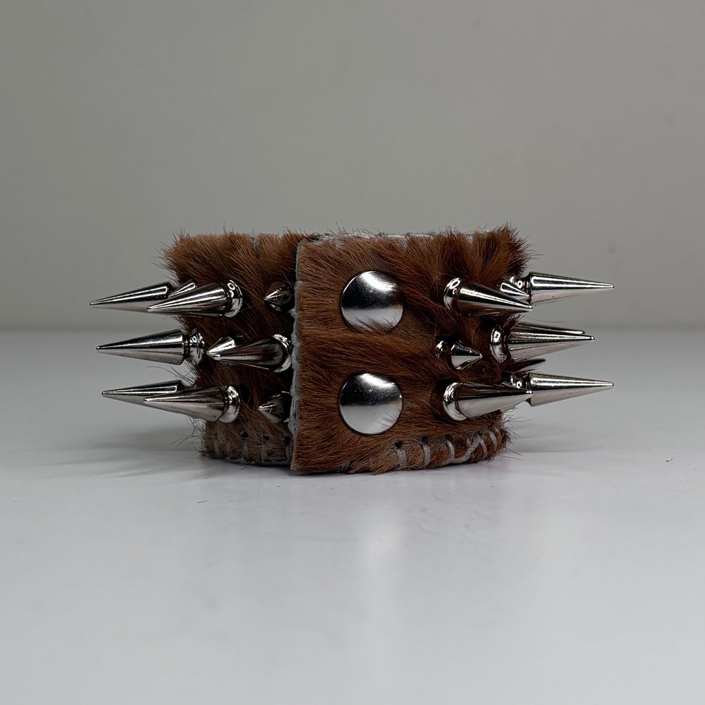 PONY HIDE HAIR-ON MULTI SPIKEY CUFF