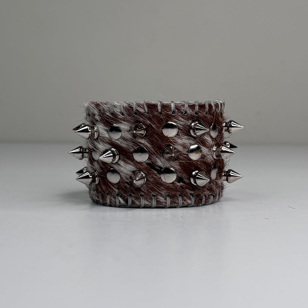 SNAKE PRINT HAIR-ON HIDE MULTI SPIKEY CUFF