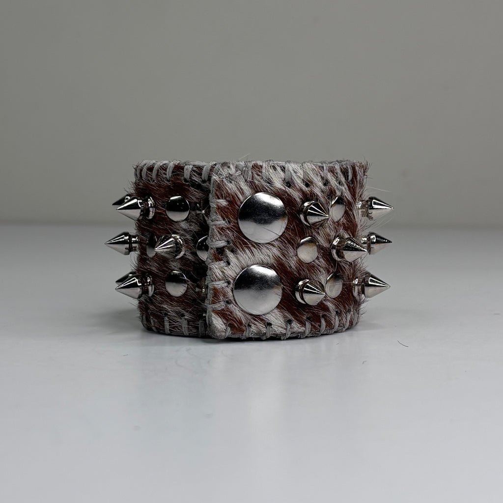 SNAKE PRINT HAIR-ON HIDE MULTI SPIKEY CUFF