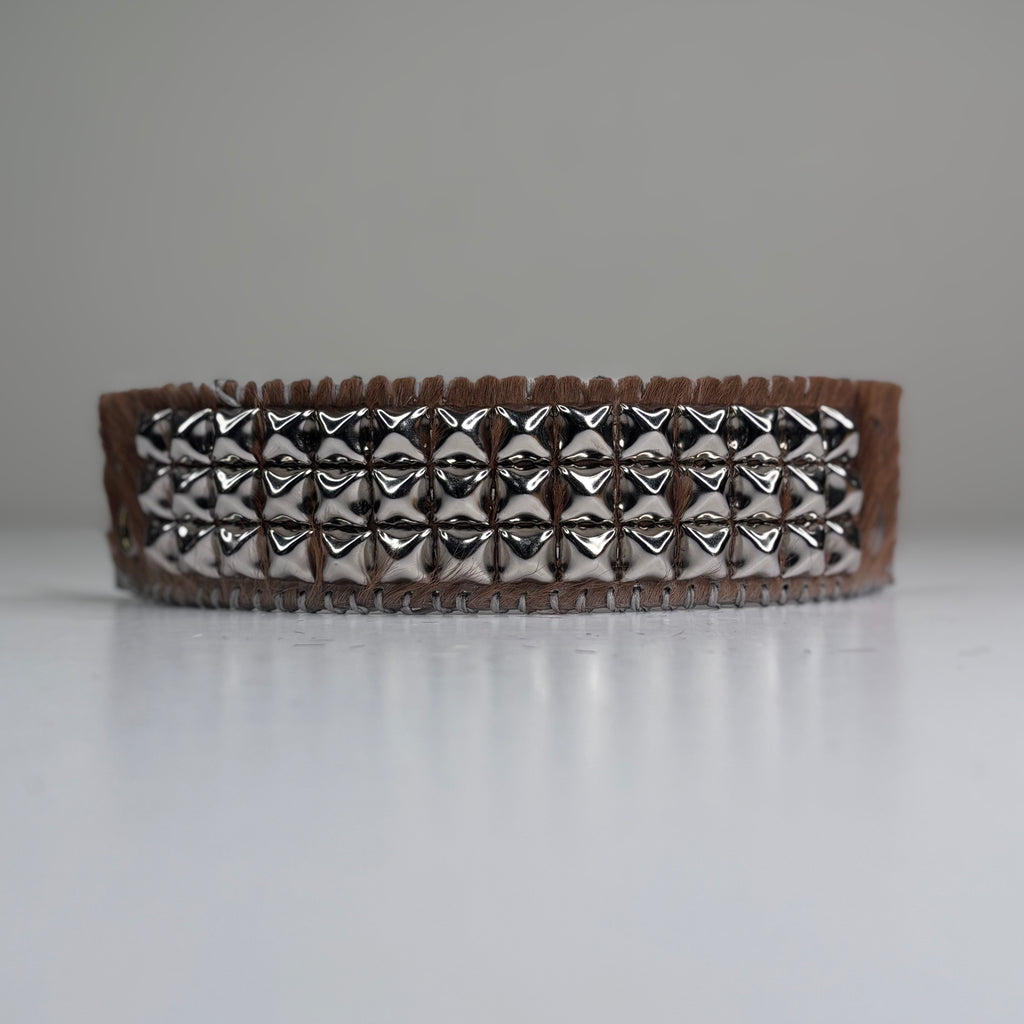 PONY HAIR-ON HIDE WITH CHROME PYRAMID STUDS